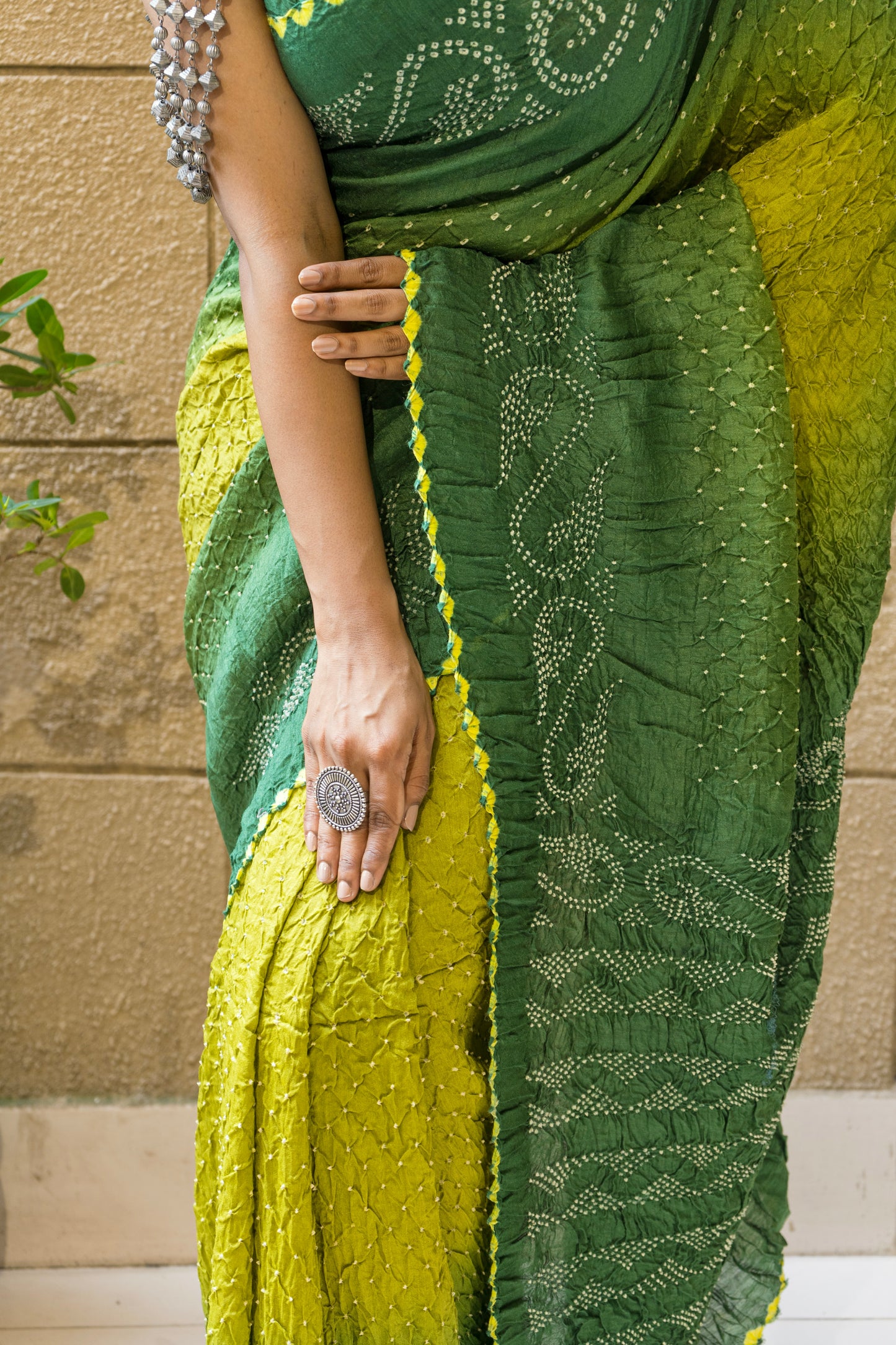 Moonga Rai Dana Bandhej Shaded Green Saree